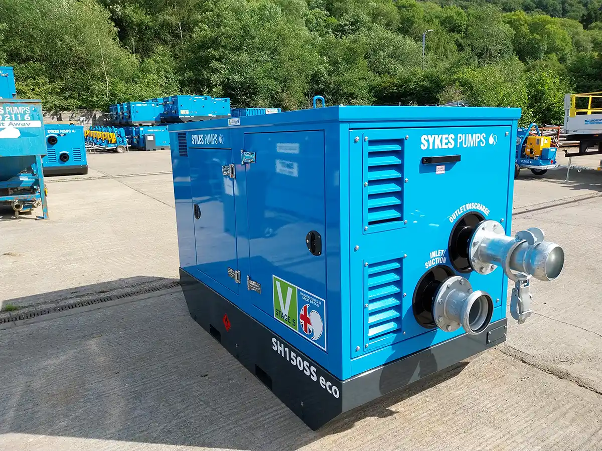 Side view of SH150 SS Eco pump installed outdoors, highlighting dual inlet/outlet suction ports